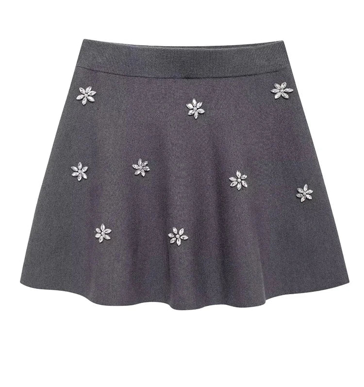 Conjunto de Suéter de Punto con Cuello Redondo y Falda Corta Plegada de Cintura Alta