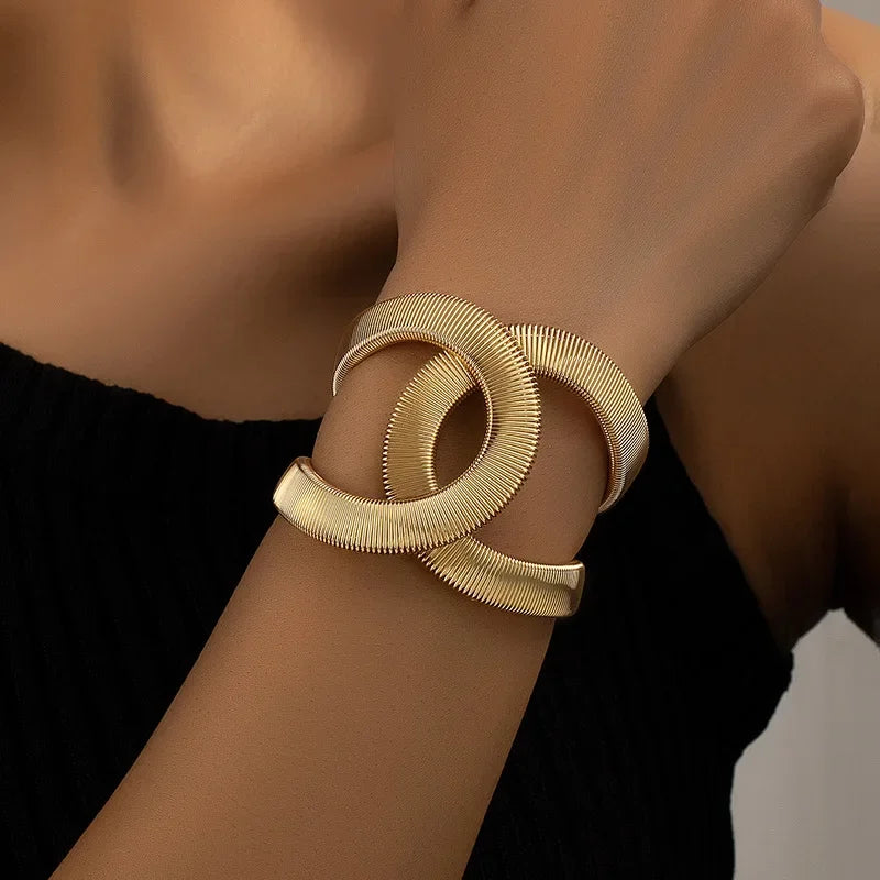 Retro Wide Metal Spring Bracelet for Women.