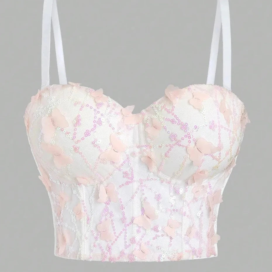 Top corto con mariposa rosa con lentejuelas, push-up, bustie.