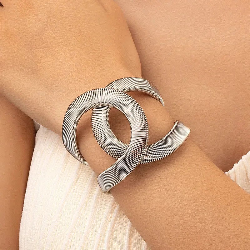 Retro Wide Metal Spring Bracelet for Women.